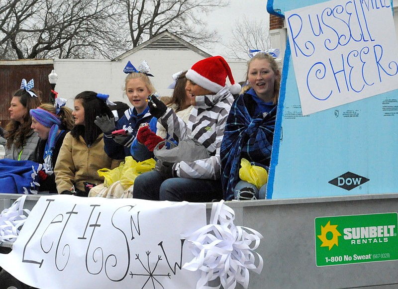 Members of Russellville Cheer participate in the Russellville Lions annual Christmas parade Saturday, Dec. 10, 2016.