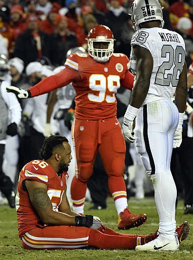 Kansas City Chiefs linebacker Derrick Johnson (56) sits injured during the first half of an NFL football game against the Oakland Raiders in Kansas City, Mo., Thursday, Dec. 8, 2016. 