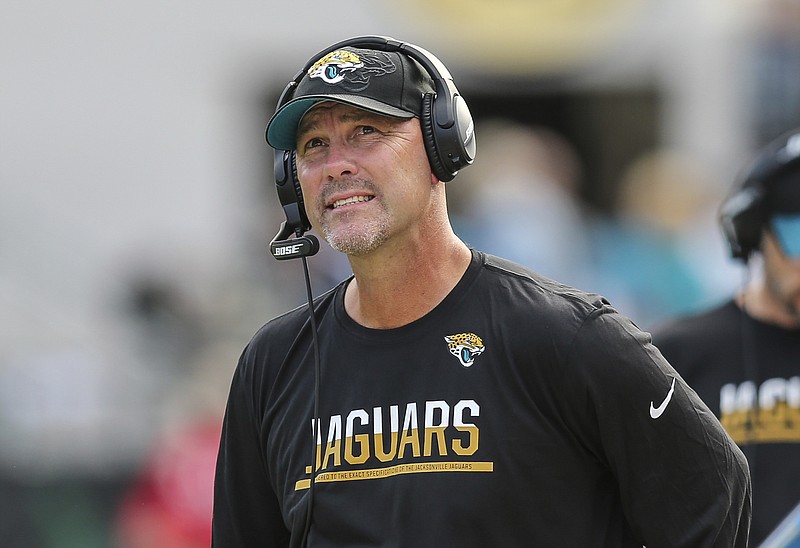 Jacksonville Jaguars head coach Gus Bradley looks up at the monitor during the second half of an NFL football game against the Denver Broncos in Jacksonville, Fla., Sunday, Dec. 4, 2016.