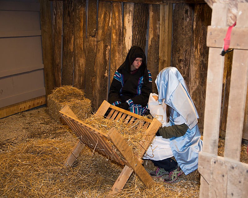Jesus is born during dress rehearsal Wednesday night at the Corticelli Baptist Church in Russellville for the church's drive-thru nativity. The display includes more than 100 cast members and will be open to the public from 6-8 p.m. Dec. 21-23.