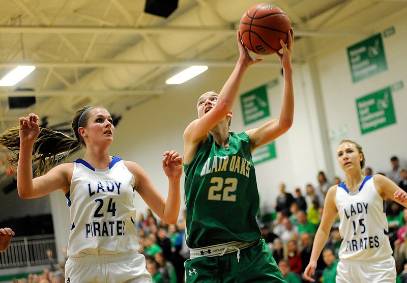 Chelsi Emerson of Blair Oaks puts up a shot during a district tournament game against Boonville in the 2013-14 season. Boonville will be joining Blair Oaks in the Tri-County Conference starting in the 2018-19 school year.