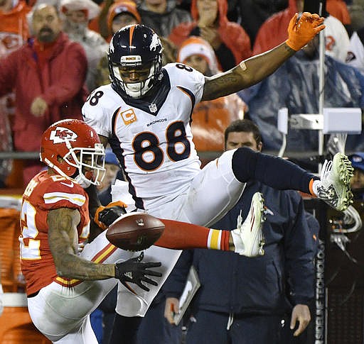 Chiefs defensive back Marcus Peters breaks up a pass intended for Broncos wide receiver Demaryius Thomas during the second half of Sunday night's game in Kansas City.