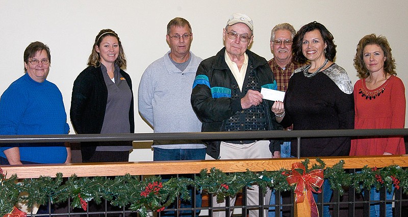 The California Area Chamber of Commerce made a $1,000 donation to support the restoration of the "Horse" which long stood in the window of Heck Saddlery on the east side of the Moniteau County Courthouse in California.