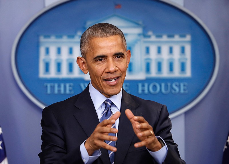 In this photo taken Dec. 16, 2016, President Barack Obama speaks during a news conference in the briefing room of the White House in Washington. President Barack Obama has imposed sanctions on Russian officials and intelligence services in retaliation for Russia's interference in the U.S. presidential election by hacking American political sites and email accounts.