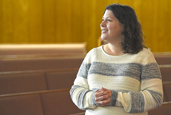 Rev. Bethany Albrecht is the new pastor for Community Christian Church. Albrecht, seen in the church's sanctuary, moved to Jefferson City from Oklahoma.