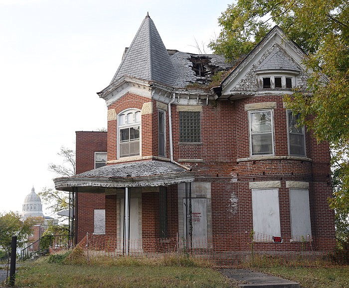 Properties on Jackson Street and State Street like this one are expected to be acquired by the Jefferson City Housing Authority. 