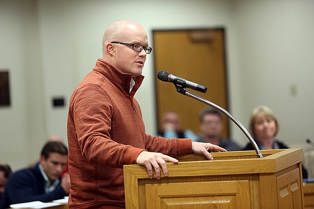 State Rep. Travis Fitzwater, R-Holts Summit, speaks at a Jefferson City Council meeting Tuesday in the John G. Christy Municipal Building. The agenda included discussion and approval of a bill that would allow Uber to operate for free on Inauguration Day, which would require a waiving of procedure.