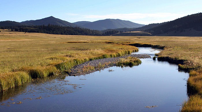  In this September 2010 photo, the East Fork of the Jemez River cuts through Valles Caldera National Preserve, New Mexico.