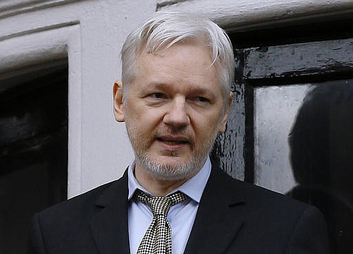 In this Friday Feb. 5, 2016 file photo, Wikileaks founder Julian Assange speaks from the balcony of the Ecuadorean Embassy in London. 