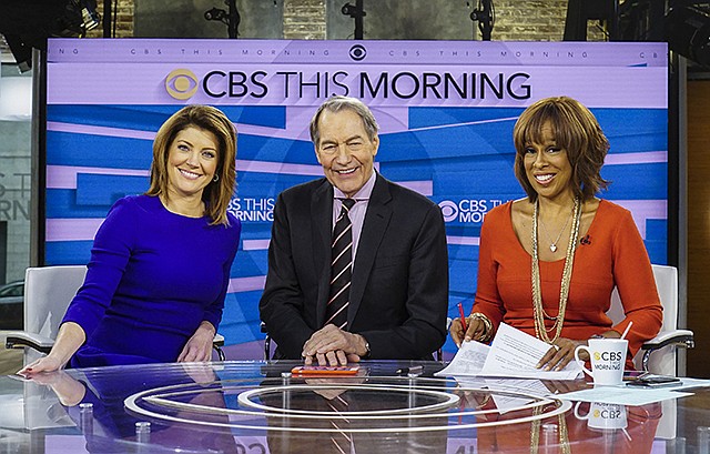 From left, Norah O'Donnell, Charlie Rose and Gayle King are shown Dec. 7 on the set of "CBS This Morning," in New York.