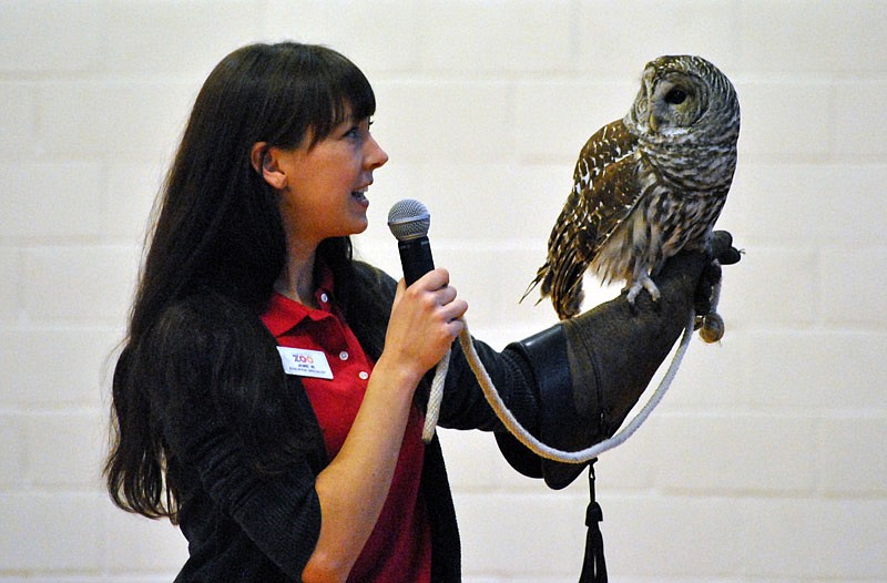 Jamie Williams, education specialist at Dickerson Zoo, discusses characteristics of the barred owl to guests during one of several programs given at Heritage Elementary in Lake Ozark, Mo. 
