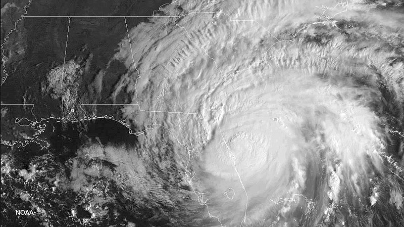 This image provided by NOAA. taken Oct. 7, 2016, shows Hurricane Matthew over the Southeastern part of the U.S. A new study finds wind and water shifts during busy hurricane seasons seem to provide a somewhat protective barrier for the U.S. coast. Last year's Hurricane Matthew, which was a major storm and hit Haiti with 145 mph winds but fizzled as it neared the American mainland, is a good example.This Oct. 7, 2016 satellite image shows Matthew as it threatens Florida, but it later hit South Carolina as a minimal hurricane with 75 mph winds. 