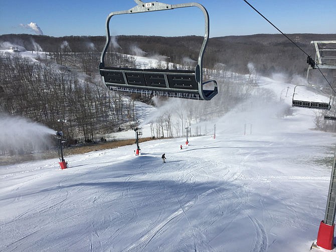 Snow is added to the slopes at Hidden Valley Ski Resort in Wildwood. The resort offers skiing, snowboarding and snow tubing December through mid-March.