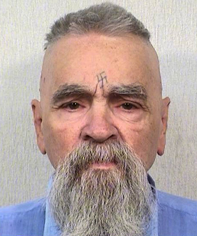 This Oct. 8, 2014 file photo provided by the California Department of Corrections and Rehabilitation shows serial killer Charles Manson. California prison official says cult killer Manson is alive following reports that he was hospitalized on Tuesday, Jan. 3, 2017. 