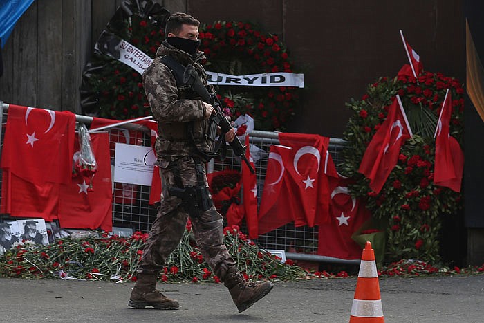 A Turkish special security force member patrols near the scene of the Reina night club following the New Year's day attack, in Istanbul, Wednesday.