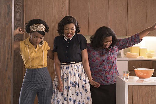 This image released by Twentieth Century Fox shows Janelle Monae, from left, Taraji P. Henson and Octavia Spencer in a scene from "Hidden Figures."