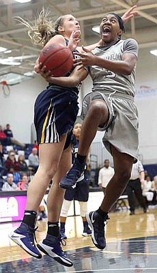 Khadijah Ellison of Lincoln drives to the basket during Thursday's game with Central Oklahoma at Jason Gym.