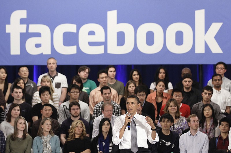 In this April 20, 2011, file photo, President Barack Obama gestures during a town hall meeting at Facebook headquarters in Palo Alto, Calif. The year Obama came into office, the White House joined Facebook, Twitter, Flickr, Vimeo, iTunes and MySpace. In 2013, the first lady posted her first photo to Instagram. In 2015, Obama sent his first tweet from @POTUS, an account which now has 11 million followers. This year, the White House posted its first official story on Snapchat, a promotion of the president's State of the Union address. White House officials said the focus on social media is simply a strategy of going to where people get their news. 