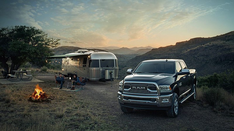 The RAM 2500 Limited sports body-color bumpers and a new billet port grille that combine for a bold statement on the road. Limited model shown with available Chrome Bumper Packeage.
