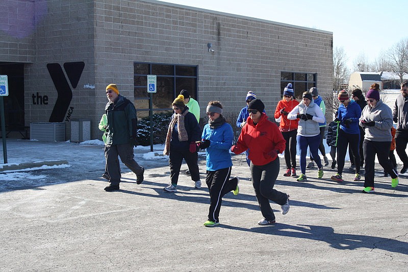 Runners and walkers brave freezing temperatures in Fulton to participate in the first Hot Cocoa Hustle 5K, held Saturday, Jan. 7, 2017 by the YMCA of Callaway County. The race was sponsored by businesses from around Fulton, and the hot cocoa was provided by Fresh Ideas, the company that operates the William Woods University dining hall.