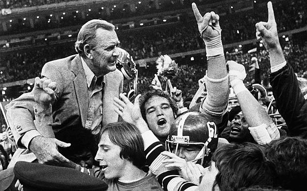 In this Jan. 3, 1978, file photo, Alabama coach Paul "Bear" Bryant is carried from the field after defeating Ohio State in the Sugar Bowl in New Orleans.
