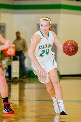 Claire Heckman of Blair Oaks brings the ball downcourt during Monday night's game against Linn in Wardsville.