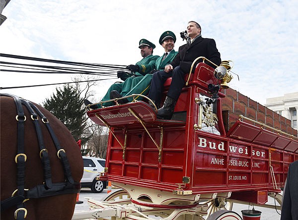 Gov. Eric Greitens was chauffeured to the Governor's Mansion via the Budweiser Clydesdales and wagon Monday. After inspection of the troops, Greitens hopped on the wagon and was dropped off in time to meet and greet supporters at the family's residence.