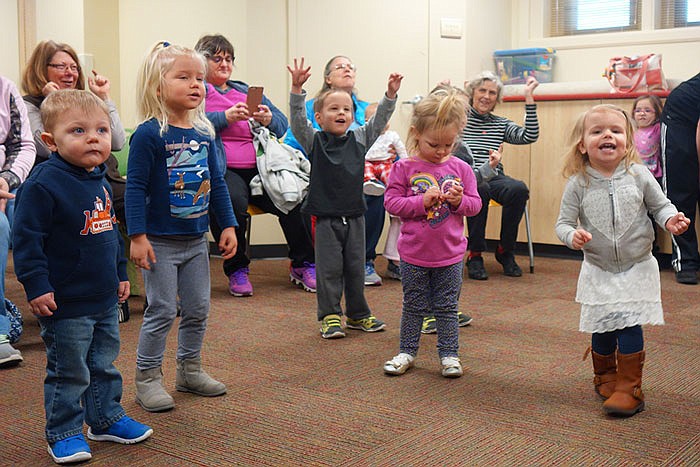 Exhuberant kids dance at the Callaway County Public Library's dance party for 0-3 year olds.