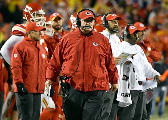 Chiefs coach Andy Reid walks the sideline during this season's game against the Broncos on Christmas at Arrowhead Stadium.