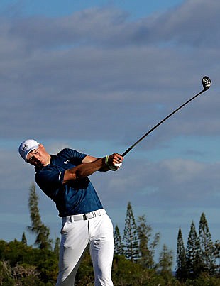 Jordan Spieth hits from the fourth tee during Sunday's final round of the Tournament of Champions in Kapalua, Hawaii.