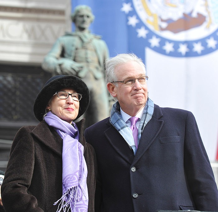 Former Missouri Gov. Jay Nixon, right, and First Lady Georganne Nixon stand at the concluding prayer Monday, Jan. 9, 2017 during the inauguration of Gov. Eric Greitens in Jefferson City. 