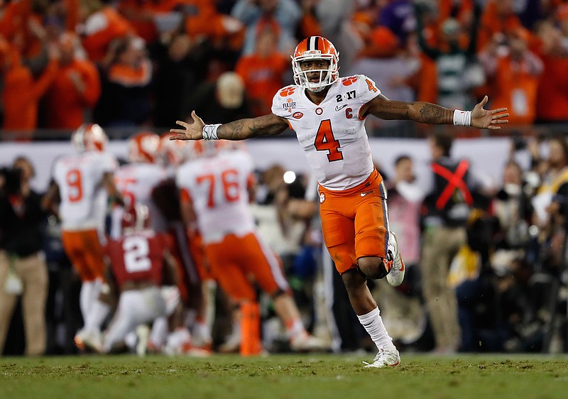 Clemson's Deshaun Watson celebrates a last second touchdown pass to Hunter Renfrow during the second half of the NCAA college football playoff championship game against Alabama Tuesday, Jan. 10, 2017, in Tampa, Fla. 