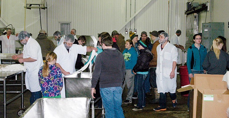 Members of 27 different 4-H and FFA organizations swarmed in to Burgers' Smokehouse on Saturday, Jan. 7, 2017, beginning when the doors opened at 6:45 a.m. The purpose was to choose one or more of the about 600 fresh hams to cure.