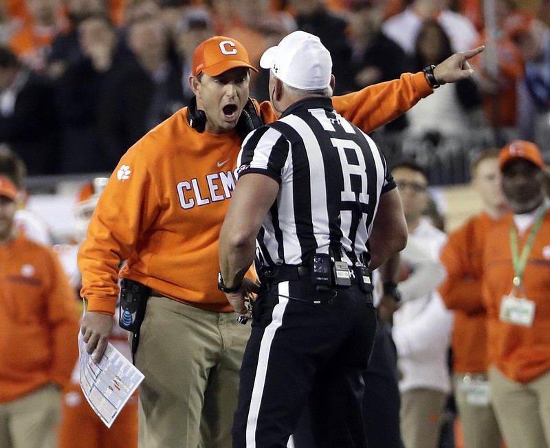 Clemson head coach Dabo Swinney argues a call during the first half of the NCAA college football playoff championship game against Alabama Monday, Jan. 9, 2017, in Tampa, Fla.