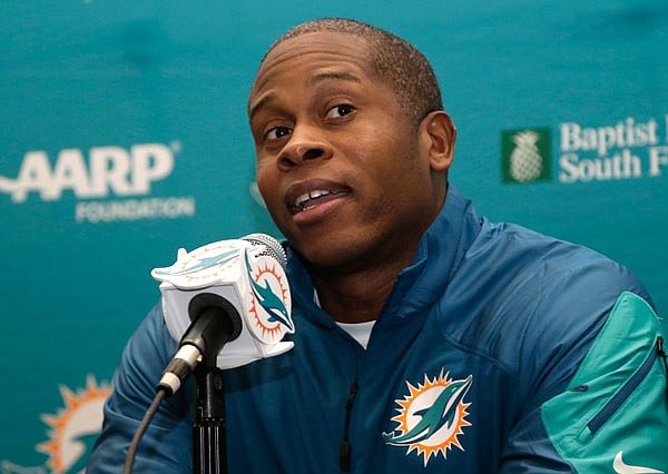 In this Jan. 28, 2016, file photo, Dolphins defensive coordinator Vance Joseph responds to a question during a news conference in Davie, Fla. Joseph will be introduced as the Broncos' new head coach today.