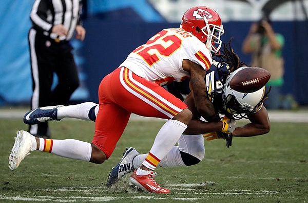 Chiefs cornerback Marcus Peters knocks away a pass intended for Chargers wide receiver Geremy Davis during a game earlier this month in San Diego.