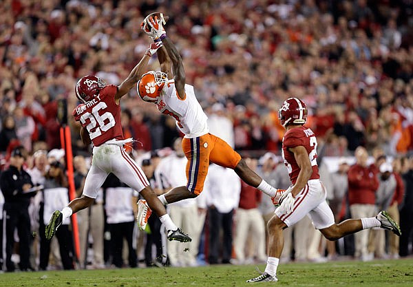 Clemson's Mike Williams catches a pass in front of Alabama's Marlon Humphrey during Tuesday night's College Football Playoff championship game in Tampa, Fla. Humphrey is among the Crimson Tide players who have declared for the NFL draft.