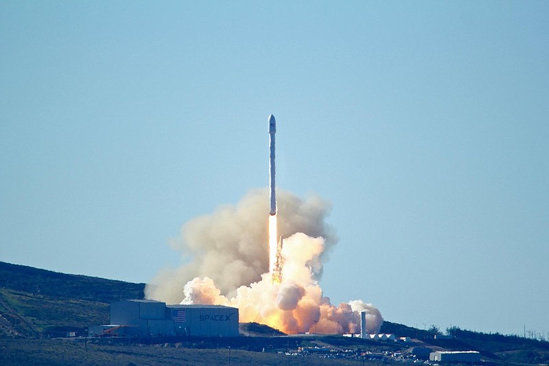 Space-X's Falcon 9 rocket with 10 satellites  launches at Vandenberg Air Force Base, Calif. on Saturday, Jan. 14, 2017.  The two-stage rocket lifted off  to place 10 satellites into orbit for Iridium Communications Inc.  About nine minutes later, the first stage returned to Earth and landed successfully on a barge in the Pacific Ocean south of Vandenberg. 