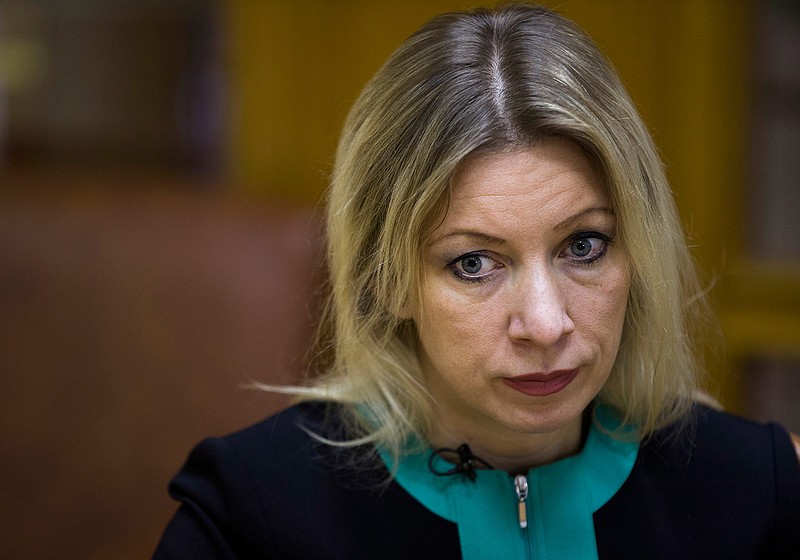 In this Tuesday, Dec. 1, 2015 file photo Russian Foreign Ministry spokeswoman Maria Zakharova listens to a question during her interview to the Associated Press in Moscow, Russia. Careful not to hurt chances for a thaw in U.S.-Russia relations, President Vladimir Putin and other Russian officials have deferred questions about their plans for future contacts with Trump and any agenda for those talks until he takes office on Friday, Jan. 20, 2017. Zakharova has denounced Obama's administration as "a bunch of geopolitical losers."