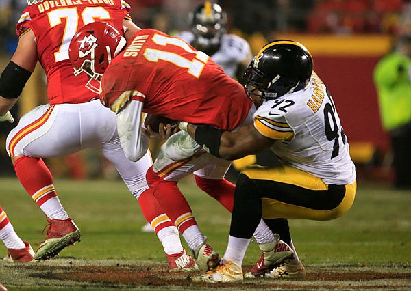 Steelers outside linebacker James Harrison sacks Chiefs quarterback Alex Smith during the second half of Sunday's NFL divisional playoff game in Kansas City.