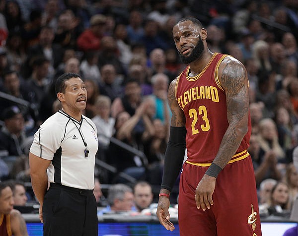 Cavaliers forward LeBron James reacts after being called for a technical foul by referee Bill Kennedy during the first quarter of last Friday's game against the Kings in Sacramento, Calif.