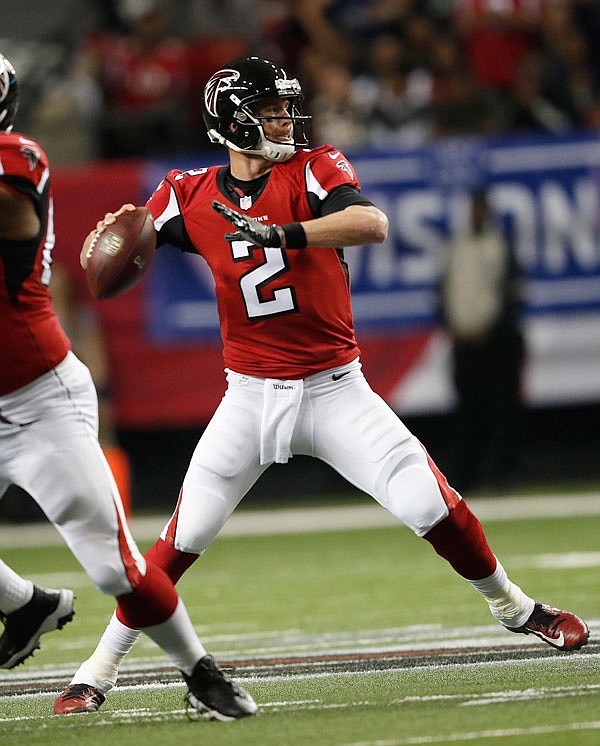 Falcons quarterback Matt Ryan works against the Seahawks during the first half of Sunday's NFC divisional playoff game in Atlanta.