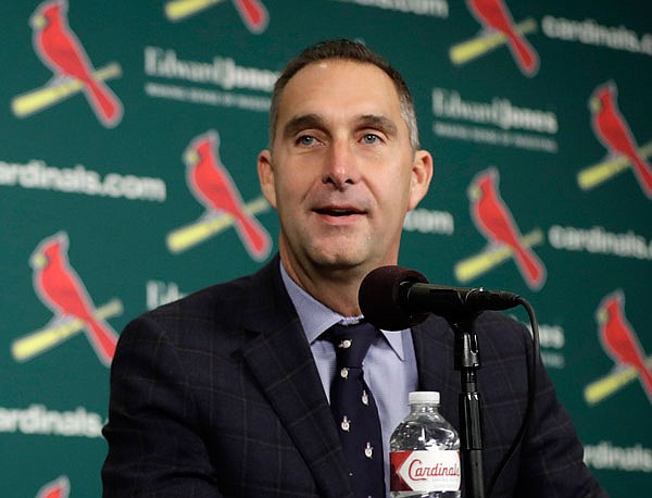 In this Dec. 9, 2016, file photo, Cardinals general manager John Mozeliak speaks during an introductory news conference announcing free agent center fielder Dexter Fowler signed with the Cardinals in St. Louis.