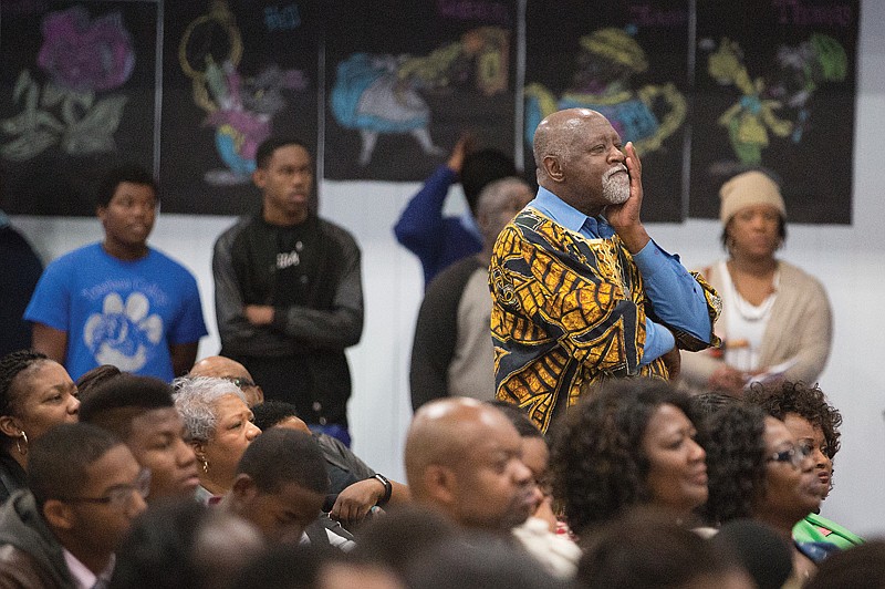 The crowd listens as the Rev. Dr. Cory Brown talks about the need for a more-involved black community Monday during the keynote presentation of the Greater Texarkana Branch of the NAACP at Dunbar Elementary in Texarkana, Texas. 