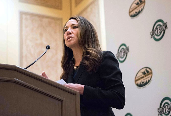 Dr. Christine Moutier, medical director for the American Foundation for Suicide Prevention, discusses an initiative with the National Shooting Sports Foundation to prevent suicide, Tuesday in Las Vegas. 