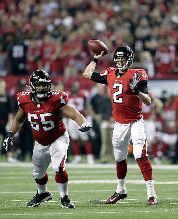 Falcons quarterback Matt Ryan looks to pass during Saturday's playoff game against the Seahawks in Atlanta.