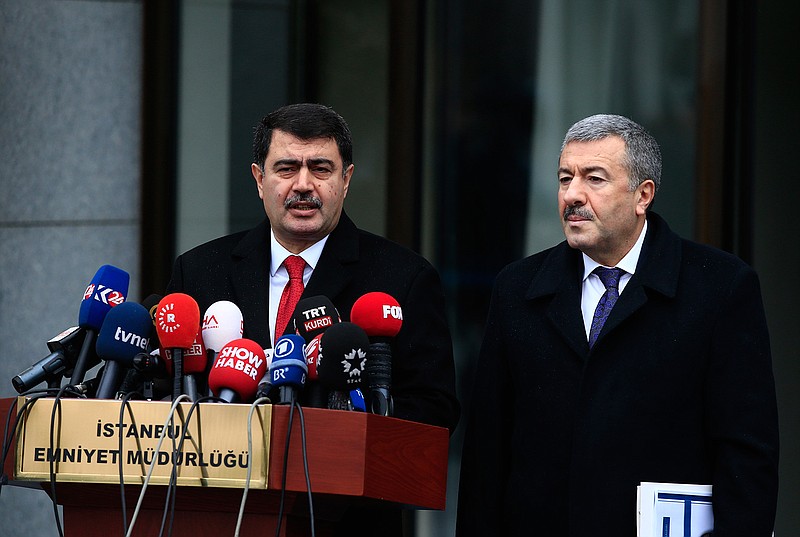 Istanbul Gov. Vasip Sahin, left, accompanied by Police Chief Mustafa Caliskan, talks to the media during a news conference regarding the arrest of a suspect of New Year's nightclub attack in Istanbul, Tuesday, Jan. 17, 2017. Police said they had caught the gunman who killed 39 people at the attack on a nightclub in Istanbul during New Year's celebrations. Sachin said it's clear that the attack was carried out on behalf of the Islamic State group. 