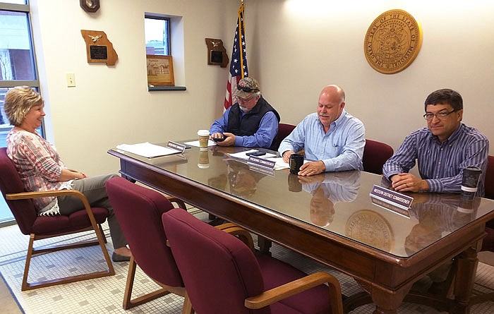 Left to right: Callaway County Auditor Karen Rentschler and commissioners Randy Kleindienst, Gary Jungermann and Roger Fischer quickly resolved a budget error during a Thursday meeting.