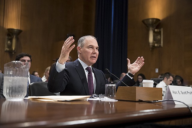 Environmental Protection Agency Administrator-designate, Oklahoma Attorney General Scott Pruitt, testifies Wednesday on Capitol Hill in Washington, at his confirmation hearing before the Senate Environment and Public Works Committee.