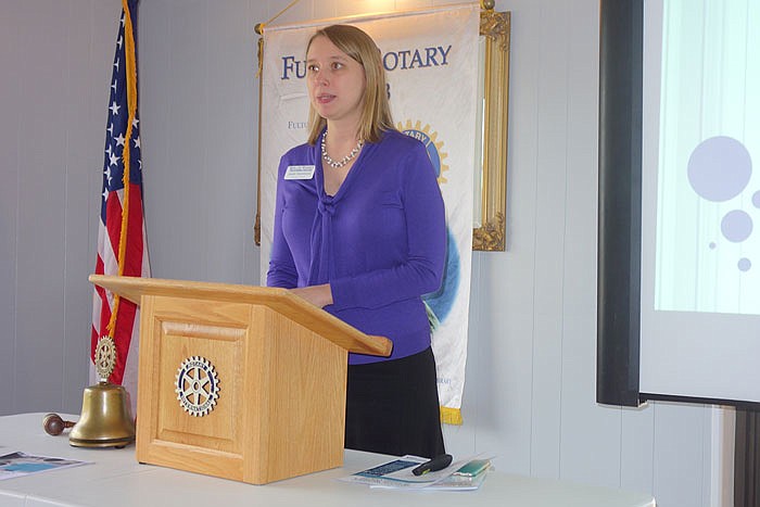 Jamie Freidrichs, director of the Missouri Women's Business Center, updates the Rotary Club on the center's progress since opening a branch in Fulton.